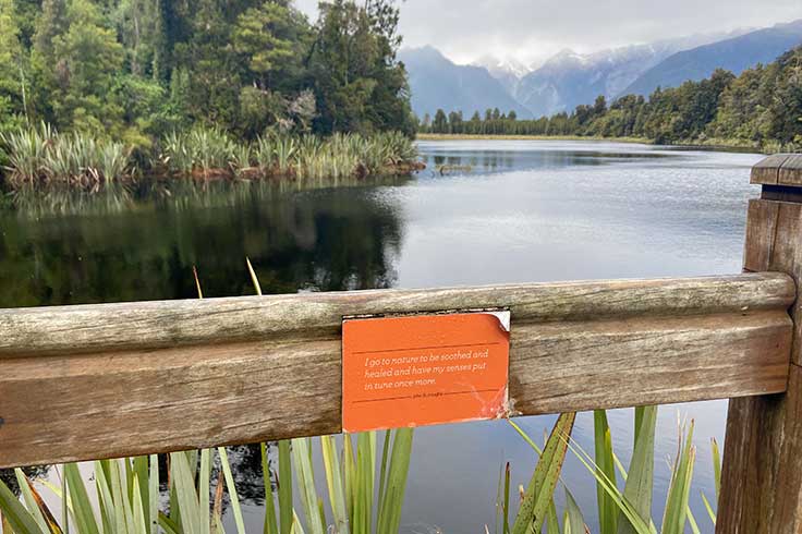 Motivational signpost by Lake Matheson, South Island, New Zealand. 